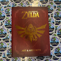 GAME GUIDES - “THE LEGEND OF ZELDA” ART & ARTIFACTS COMPLETE HARDBACK ART BOOK