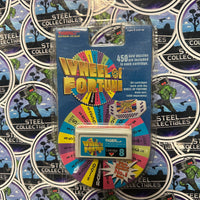 Tiger Electronics- Vintage 1995 Handheld “Wheel Of Fortune” Retro Game Console w/ New/Sealed Cartridges (#7-9)