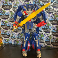 Transformers- “Transformers: Age of Extinction” Optimus Prime (Bayverse) Voyager Class Poseable Action Figure