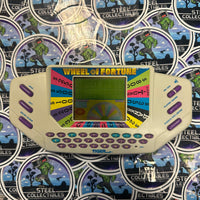 Tiger Electronics- Vintage 1995 Handheld “Wheel Of Fortune” Retro Game Console w/ New/Sealed Cartridges (#7-9)