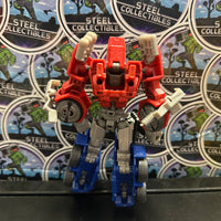 Transformers- “Transformers: War for Cybertron” Optimus Prime (WFC) Deluxe Class Action Figure
