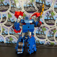 Transformers- “Transformers: Robots in Disguise” Optimus Prime (RID) Deluxe Class Action Figure