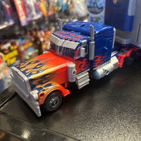 Transformers- “Transformers: Dark of the Moon” Optimus Prime w/ Mech Tech Trailer Voyager Class Figure