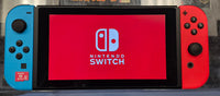 NINTENDO SWITCH CONSOLE (MODEL 2) W/ RED & BLUE JOYCONS & RED CASE