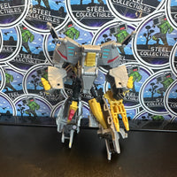 Transformers- “Transformers: Earthspark” Grimlock Deluxe Class Poseable Action Figure
