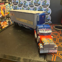 Transformers- “Transformers: Dark of the Moon” Optimus Prime w/ Mech Tech Trailer Voyager Class Figure