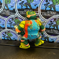 TMNT- Playmates 1990 “Teenage Mutant Ninja Turtles” Mike the Sewer Surfer Vintage Poseable Action Figure
