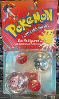 Hasbro- 1999 “Pokémon” Battle Figures with Poké Ball and Battle Discs Tangela #114 & Weezing #110 Figure (New/Sealed)
