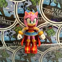 Jakks Pacific- “DC X Sonic the Hedgehog” Amy the Hedgehog as Wonder Woman 2.5” Poseable Action Figure
