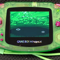 NINTENDO GAMEBOY ADVANCE CONSOLE - BACKLIT IPS SCREEN (TRANSLUCENT GREEN W/ METALLIC PURPLE BUTTONS)