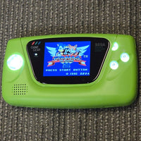 Sega Game Gear Console [Larger IPS Screen, Green Shell, USB-C Charging, Light Up Buttons, New Caps, Tempered Glass Screen] - The Ultimate Game Gear
