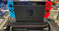 NINTENDO SWITCH CONSOLE (MODEL 2) W/ RED & BLUE JOYCONS & BLACK CASE
