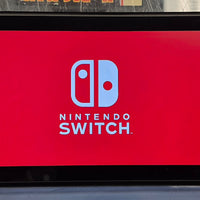 NINTENDO SWITCH CONSOLE (MODEL 2) W/ RED & BLUE JOYCONS & RED CASE