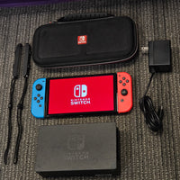 NINTENDO SWITCH OLED CONSOLE - RED & BLUE JOYCONS (HAS MODEL 1 DOCK, WORKS EXACTLY THE SAME)

