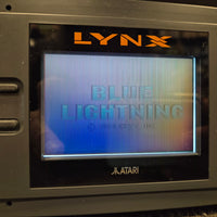 Atari Lynx Model 1 Console With 7 Games, Power Cord, and Screen Cover
